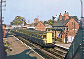 A BR Diesel Multiple Unit  Inter-City set passes through Kings Norton on the down fast line circa 1964