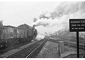 Ex-LMS 4F 0-6-0 No 44571 runs through Kings Norton Station with a Brake Van in tow on the way to the goods yard to pick up a goods working