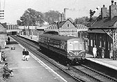 A two-car DMU stands in the down West Suburban platform on its way from Redditch to New Street on 31st May 1962