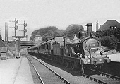 MR 2-4-0 1P No 126 is seen at the head of an empty stock working entering Kings Norton station in 1922