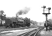 Ex-LNER 2-8-0-0-8-2 Garratt No 69999 is seen passing Kings Norton carriage sidings on its way to the Lickey Bank