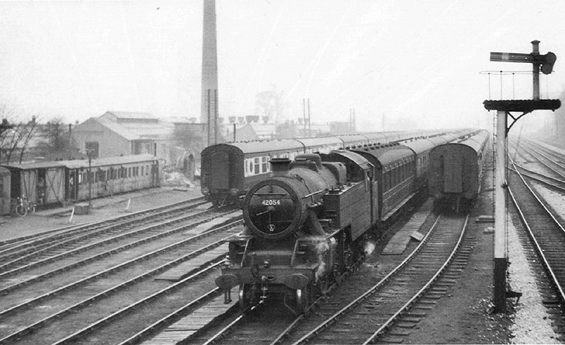 British Railways built 2-6-4T 4MT No 42054 departs from the carriage sidings with empty stock bound for New Street on 21st November 1955