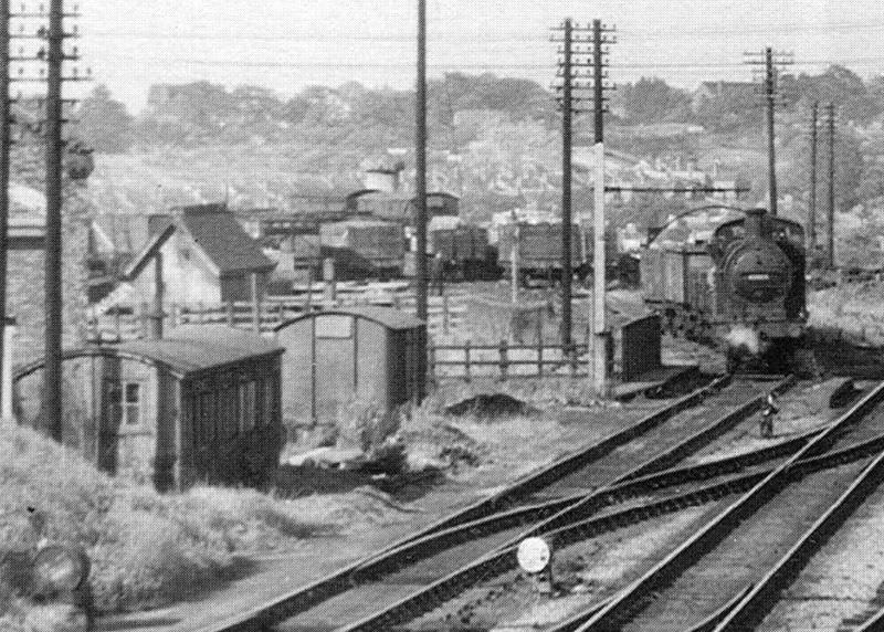 Close up showing Lifford goods yard and the assorted covered and open wagons standing in the yard
