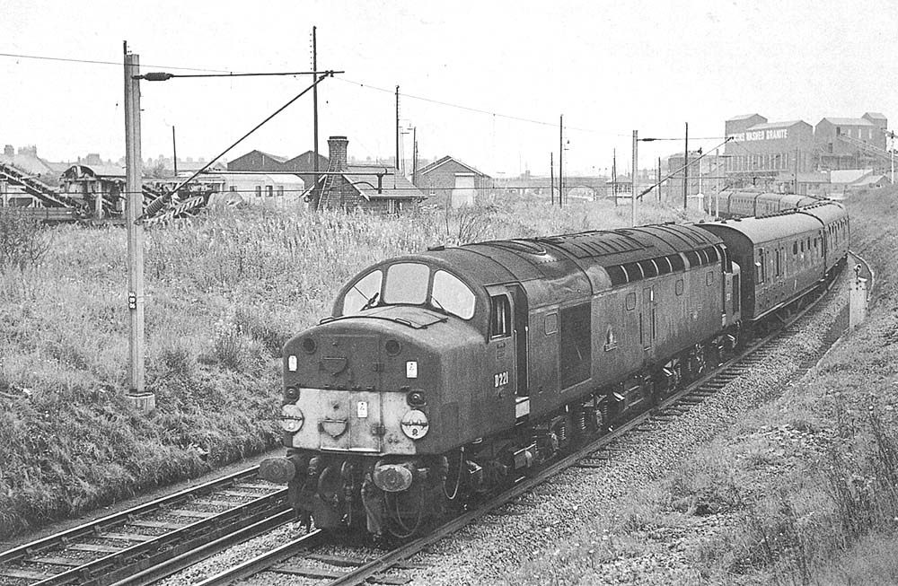 Diesel locomotive D228 Ivernia has just passed Abbey Junction as it sweeps around to join the Trent Valley Line on Sunday 12th September 1965