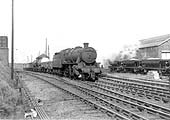 Ex-LMS' 5MT 2-6-0 No 42951, a 'Stanier Crab' is coming up from the Trent Valley line with a mixed freight