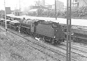 Ex-LMS 5MT 2-6-0 No 42945 carries out shunting duties with filled stone wagons from the adjacent Judkins stone wharf sidings