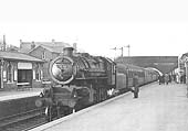 BR built 4MT 2-6-0 No 43046 arrives at the street on 12th April 1958 with the 2:26pm Ely to Birmingham service