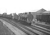 Ex-LNWR 0-8-0 7F No 49120 and classmate No 48927 pass Abbey Street goods yard with a coal train from Ashby