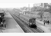 A three-car Diesel Multiple Unit stands at Abbey Street station with a service from Birmingham New Street in the 1960s