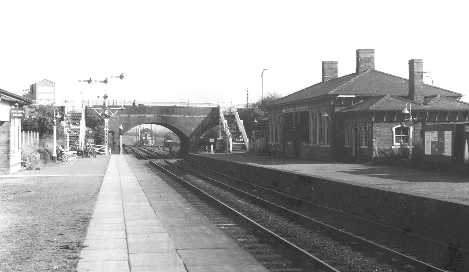 Looking East towards Leicester whist a Type 4 diesel locomotive is standing adjacent to the goods shed in the 1960s