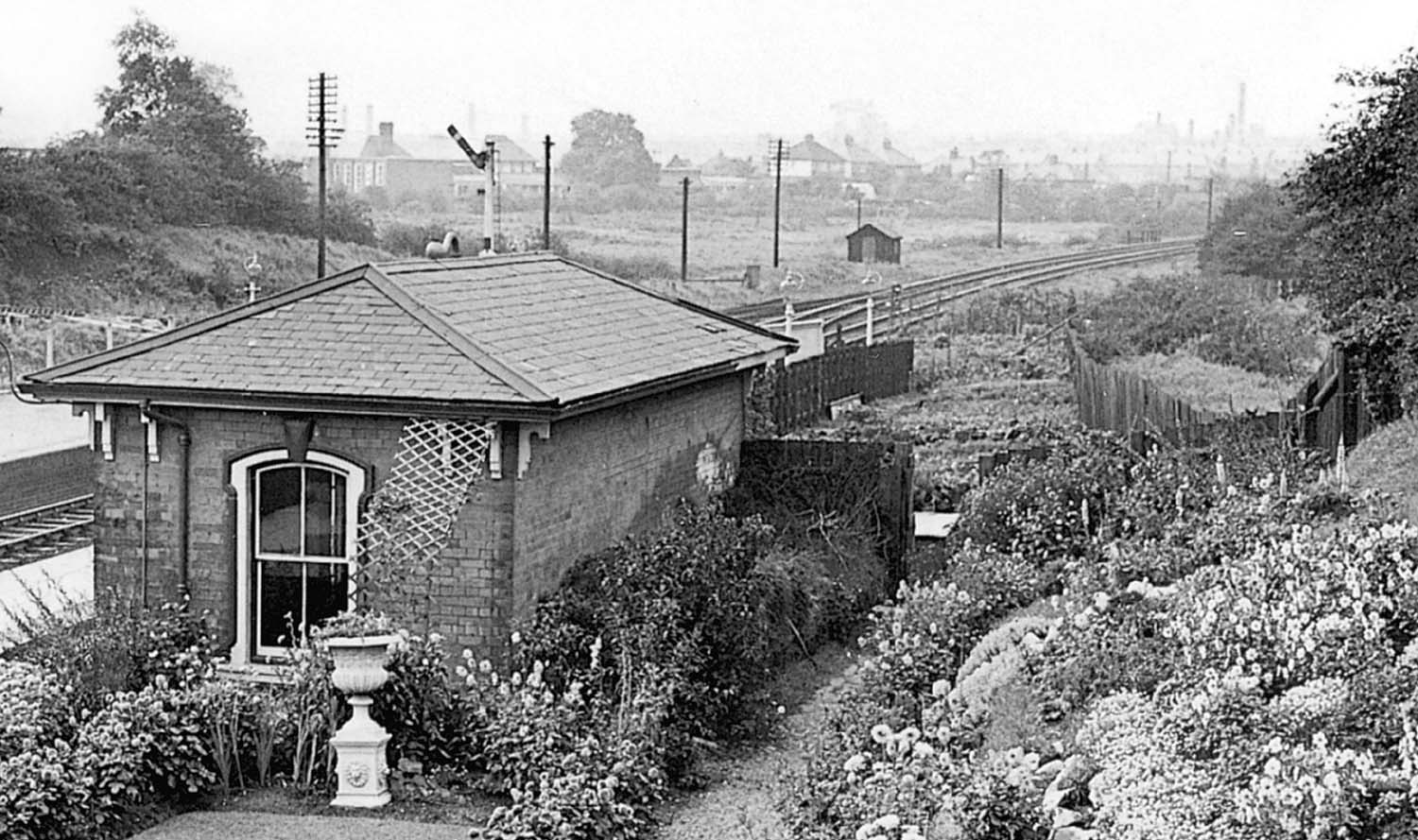 Close up showing the single storey brick built waiting room located on Abbey Street's up platform