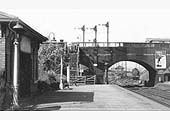 Close up looking through the bridge carrying the Midland Road over the railway to join Tuttle Hill which lies to the left