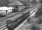 A two-car Gloucester RCW Diesel Multiple Unit passes Penns goods yard on 2nd October 1959