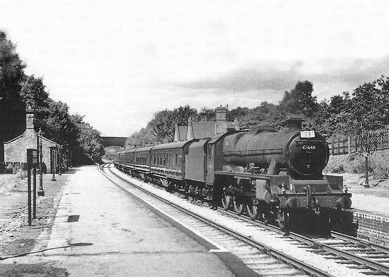 Ex-LMS 5XP 4-6-0 No 45648 'Wemyss' is seen passing through Penns at the head of the down relief Pines Express on 4th August 1962