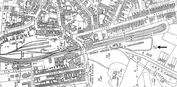 Ordnance Survey map showing the station's layout, goods yard and tunnel in 1930s