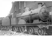 Ex-MR 3P No 712, a member of the MR's 2606 class, is seen standing alongside Saltley No 3 roundhouse with the Sand Drying Plant behind