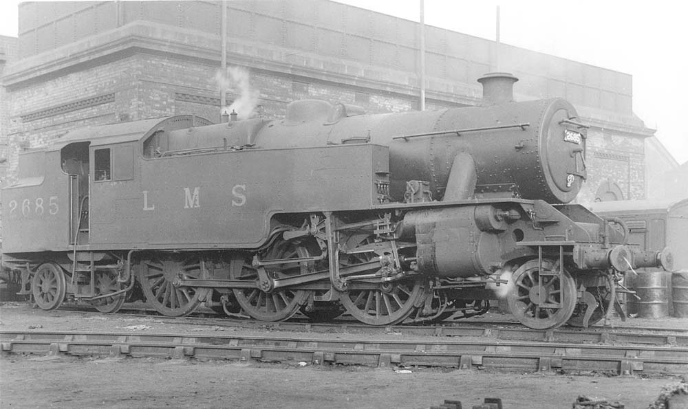 LMS 4MT 2-6-4T No 2685, designed by Fairburn, is seen standing in steam alongside Saltley's water tower adjacent to No 2 roundhouse