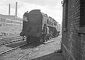 BR Standard Class 9F 2-10-0 No 92164 stands at the rear of Saltley Depot's No 3 shed after being withdrawn