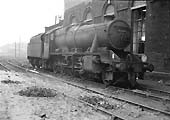 Ex-LMS 8F 2-8-0 No 48514 stands at the rear of Saltley's No 3 shed having had its tender topped up