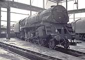British Railways 'Crosti-boilered' 9F 2-10-0 No 92028 stands inside Saltley shed's No 3 roundhouse
