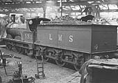 Ex-Midland Railway 2F 0-6-0 No 3311 stands inside one of Saltley shed's three roundhouses