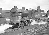 Ex-LMS 4F 0-6-0 No 44165 is seen coming off Saltley shed's coaling road on 25th March 1964