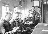 Members of Saltley Shed's breakdown gang enjoy a game of cards on their way to a breakdown date unknown