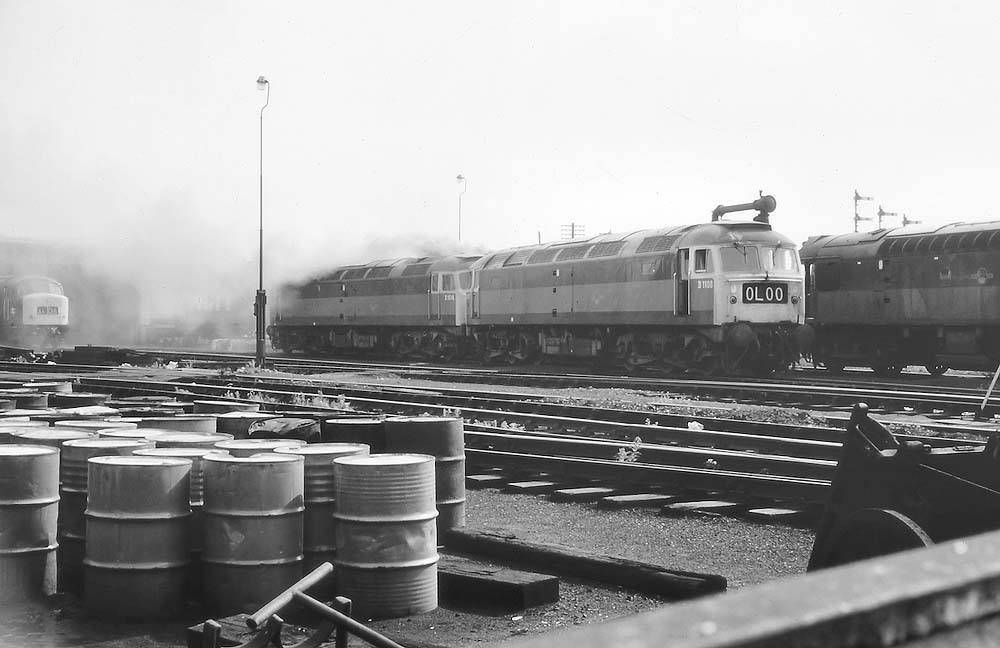 A pair of Brush Traction Co-Co diesel-electric locomotives, D1108 and D1516, create a lot of clag over Saltley on 17th July 1968