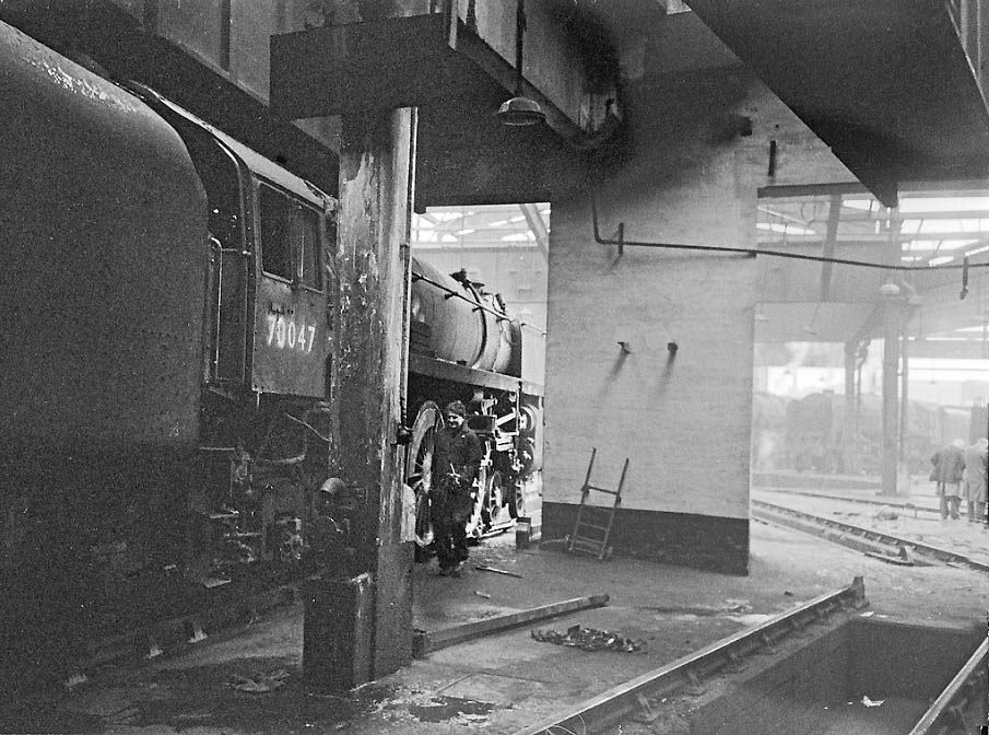 British Railways 7MT 'Britannia Class' 4-6-2 No 70047 is seen without its left hand connecting rod inside Saltley shed on 13th March 1966