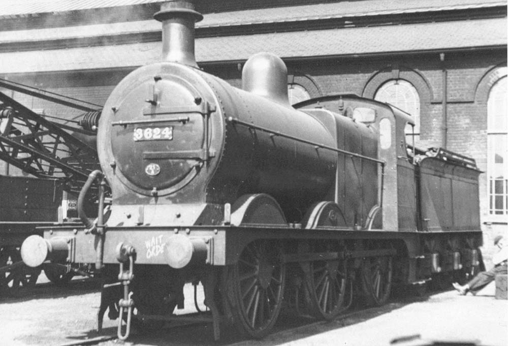 Ex-MR 3F 0-6-0 No 3624 stands out of service alongside Saltley shed's breakdown crane in September 1936