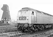 BR Type 4 Co-Co D1709 stands outside Saltley shed in July 1969 as track is being lifted in the background