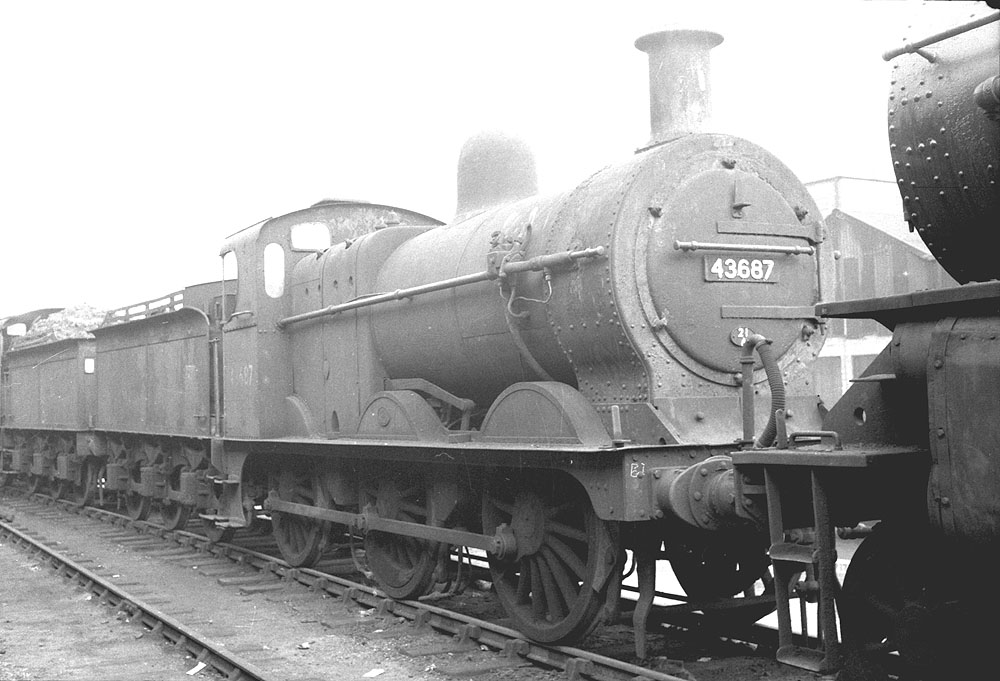 Ex-Midland Railway 3F 0-6-0 No 43687 is seen stored with other redundant locomotives at Saltley shed on 29th July 1962