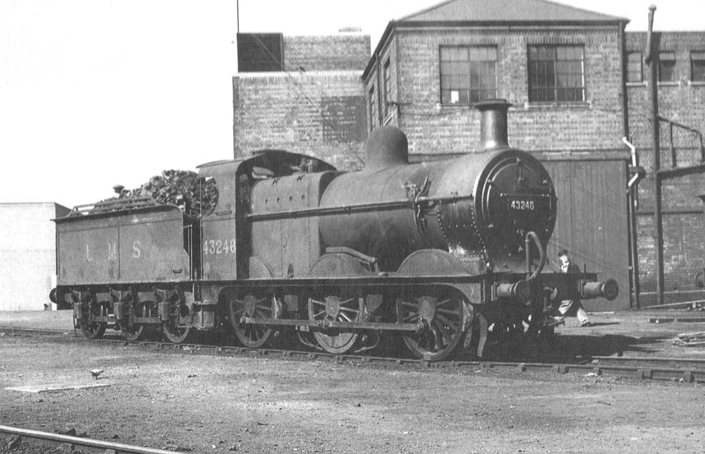 Ex-MR 0-6-0 3F 43246, with LMS still displayed on its tender, stands outside Saltley shed in 1949