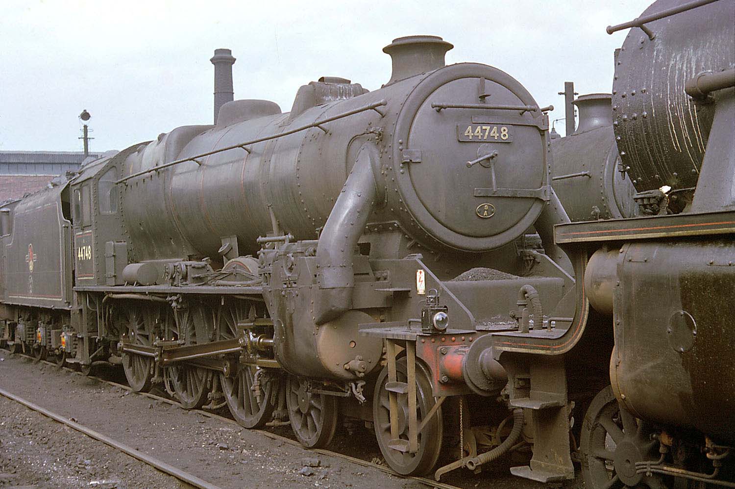 British Railways built 4-6-0 No 44748 is seen standing in line with other classes outside Saltley Number 3 shed in May 1962