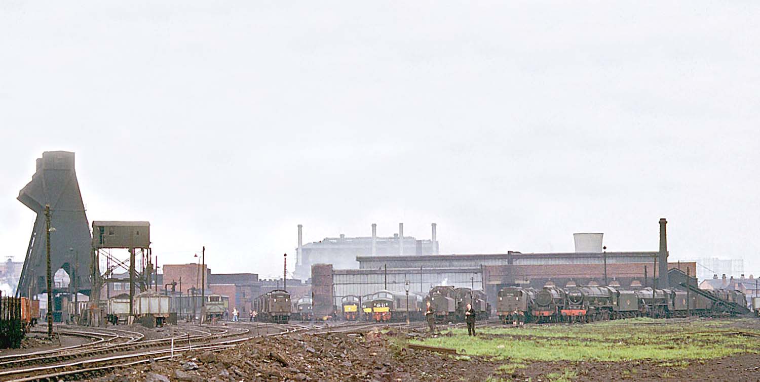 A panoramic view of Saltley shed, with its coaling tower on the left and motive power on the right, on a Sunday morning in May 1962