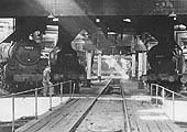 View from the turntable of one of Saltley's two roundhouses towards the other with a BR Standard locomotive in company with two ex-LMS engines