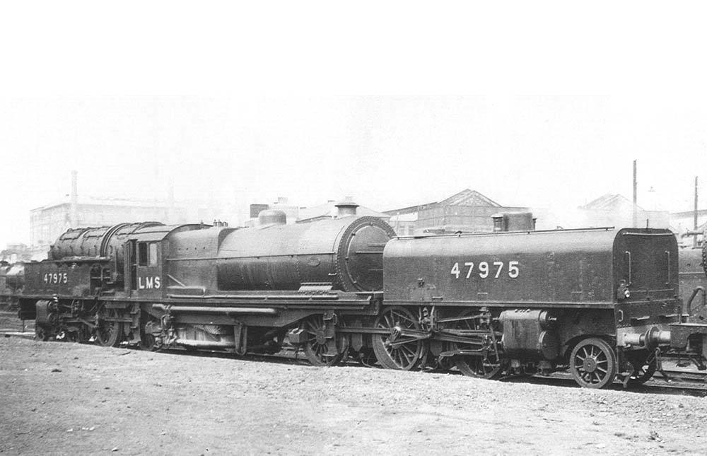 Ex-LMS 2-6-0+0-6-2 Garratt No 47975 is seen stabled with other locomotives on one of Saltley's 'back roads' located next to the Camp Hill lines
