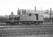 Ex-London Tilbury & Southend Railway 2P 4-4-2T No 2105 'Charing Cross' stands on one of Saltley shed's stabling roads