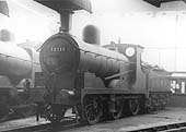 View of an ex-Lancashire & Yorkshire Railway 3F 0-6-0 No 12111 on Saturday 24th September 1932 inside one of Saltley shed's roundhouses