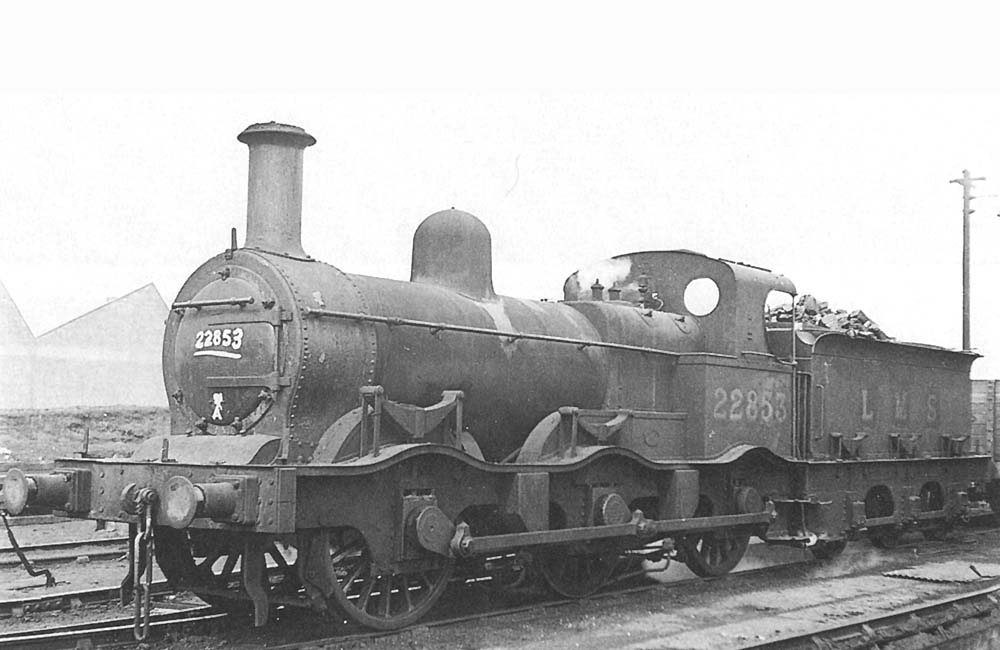 Ex-MR Kirtley 2F 0-6-0 No 22853, one of Saltley shed's elderly residents, shunts outside the shed during 1948