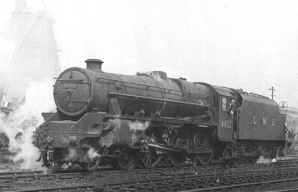 Ex-LMS 4-6-0 5MT No 4811 reverses back into the shed after being coaled and watered sometime during 1948