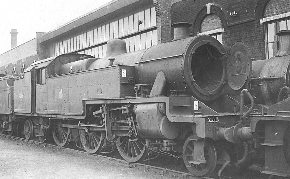Ex-LMS 4P 2-6-4T No 42416 stands alongside one of Saltley shed's roundhouse on Sunday 3rd September 1961