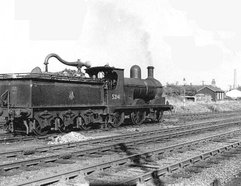 Ex-L&Y 0-6-0 No 52141 stands by the water crane during shunting duties in Stockingford marshalling yard