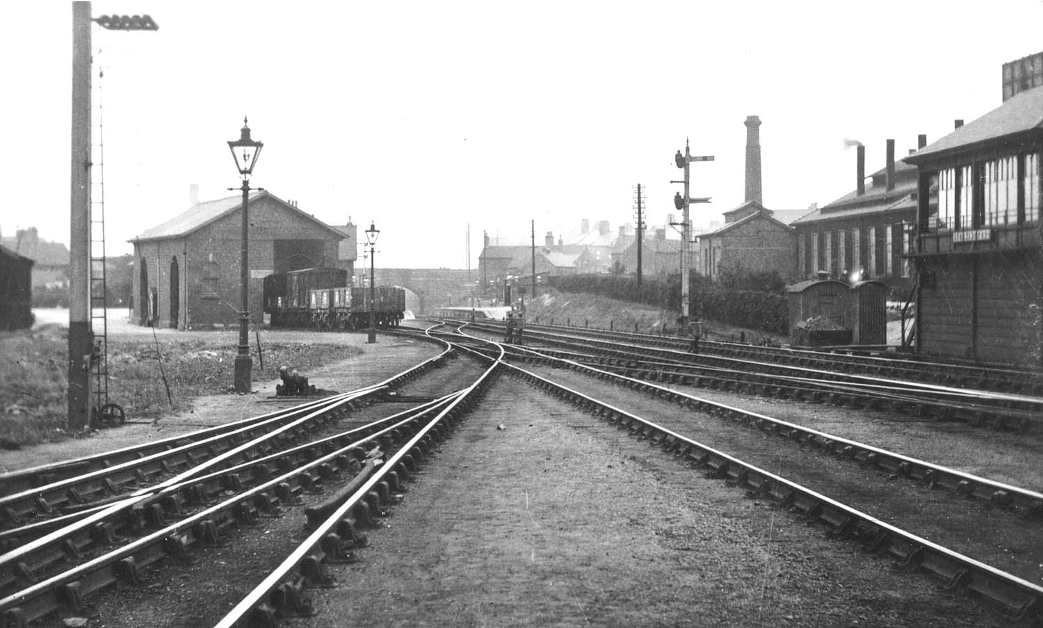 Looking towards Nuneaton from Stockingford branch line's sidings with the locomotive shed on the right behind the signal box
