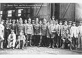 Railway police and staff pose with soldiers of the 1st Dorset Regiment outside Stockingford shed in 1911