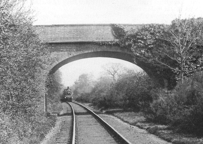 Bridge No 18 - An unidentified MR 3F 0-6-0 is seen at the head of the Whitacre to Hampton goods train