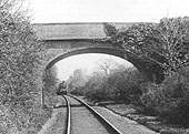 An unidentified MR 3F 0-6-0 is seen at the head of the Whitacre to Hampton goods train as it approaches Packington road over bridge