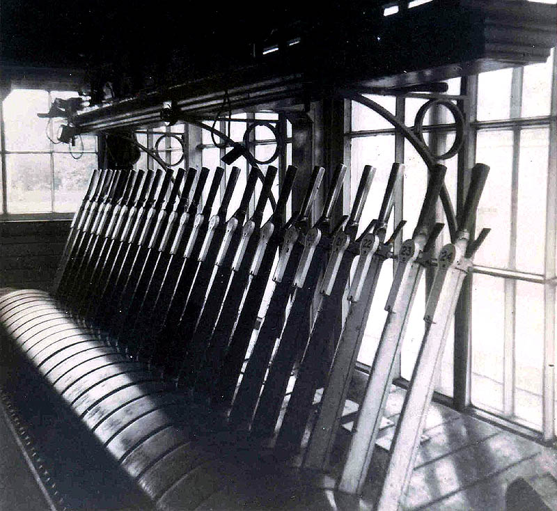 An internal view of Sutton Park signal box showing the twenty-four lever frame sited at the front of the box