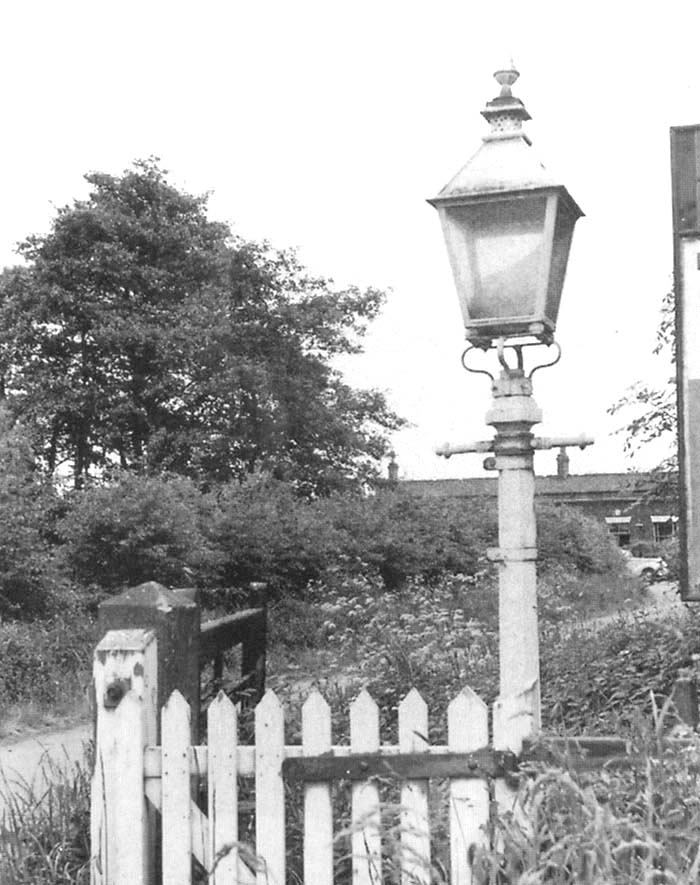 View of the lamp post sited at the entrance to the access road leading to Whitacre Station