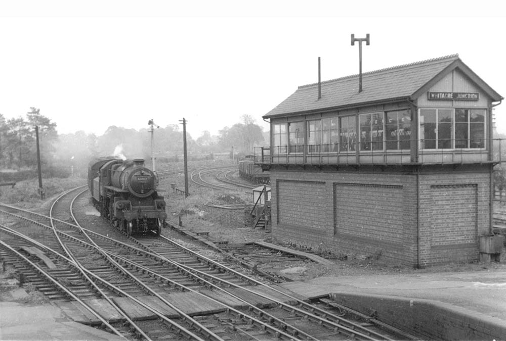 British Railways built 4MT 'Ivatt Mogul' 2-6-0 No 43017 comes off the line from Leicester at the head of a local stopping train to New Street station circa 1949